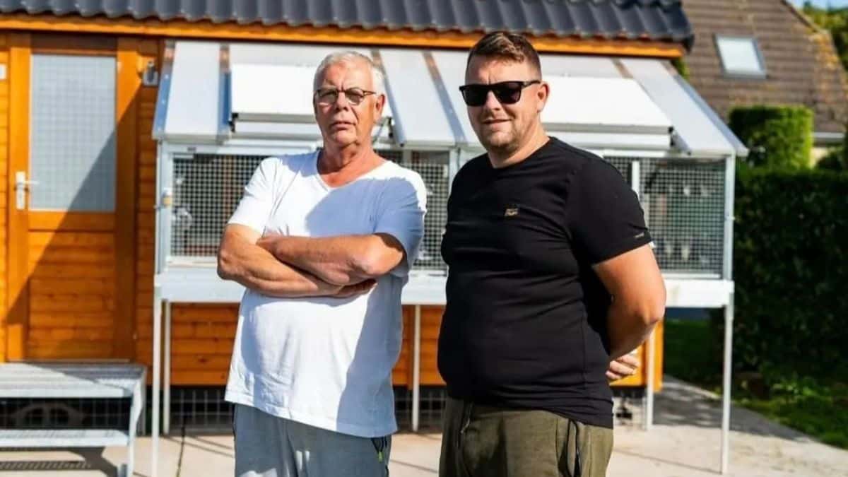 Ruud Bakker and Dolf Bakker standing proudly in front of the modern racing loft of Bakker Pigeons in Zoelen