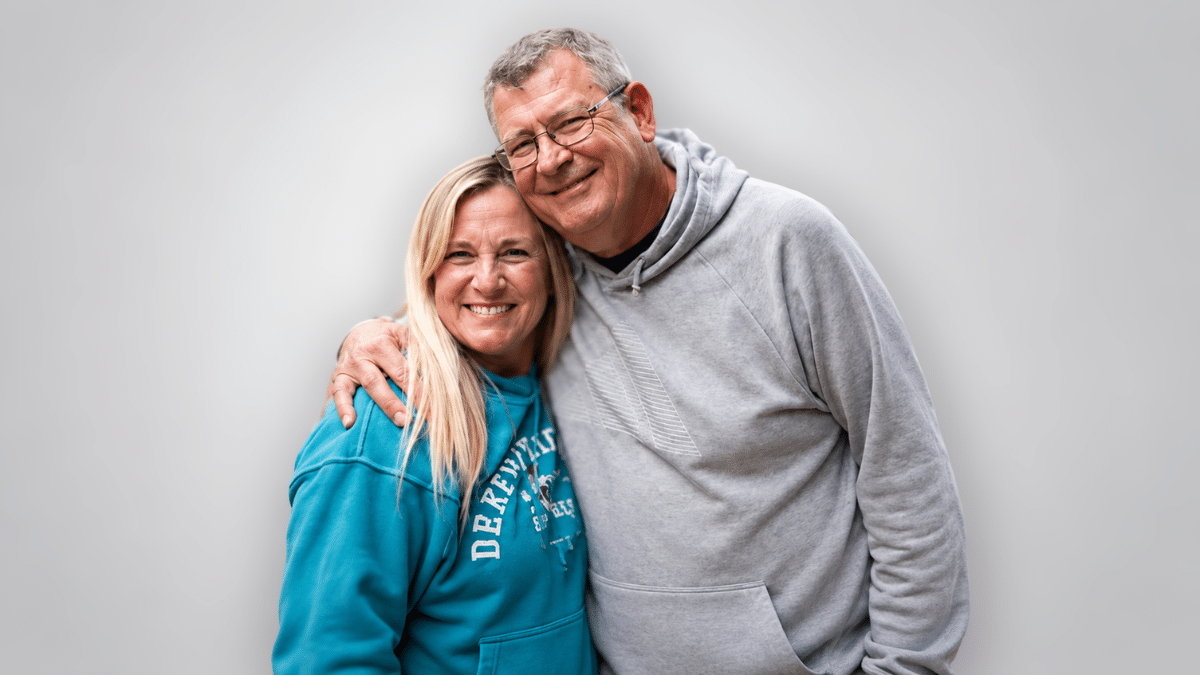 Smiling couple standing together, accompanying an article about Terry’s new leadership role at the American Racing Pigeon Union.